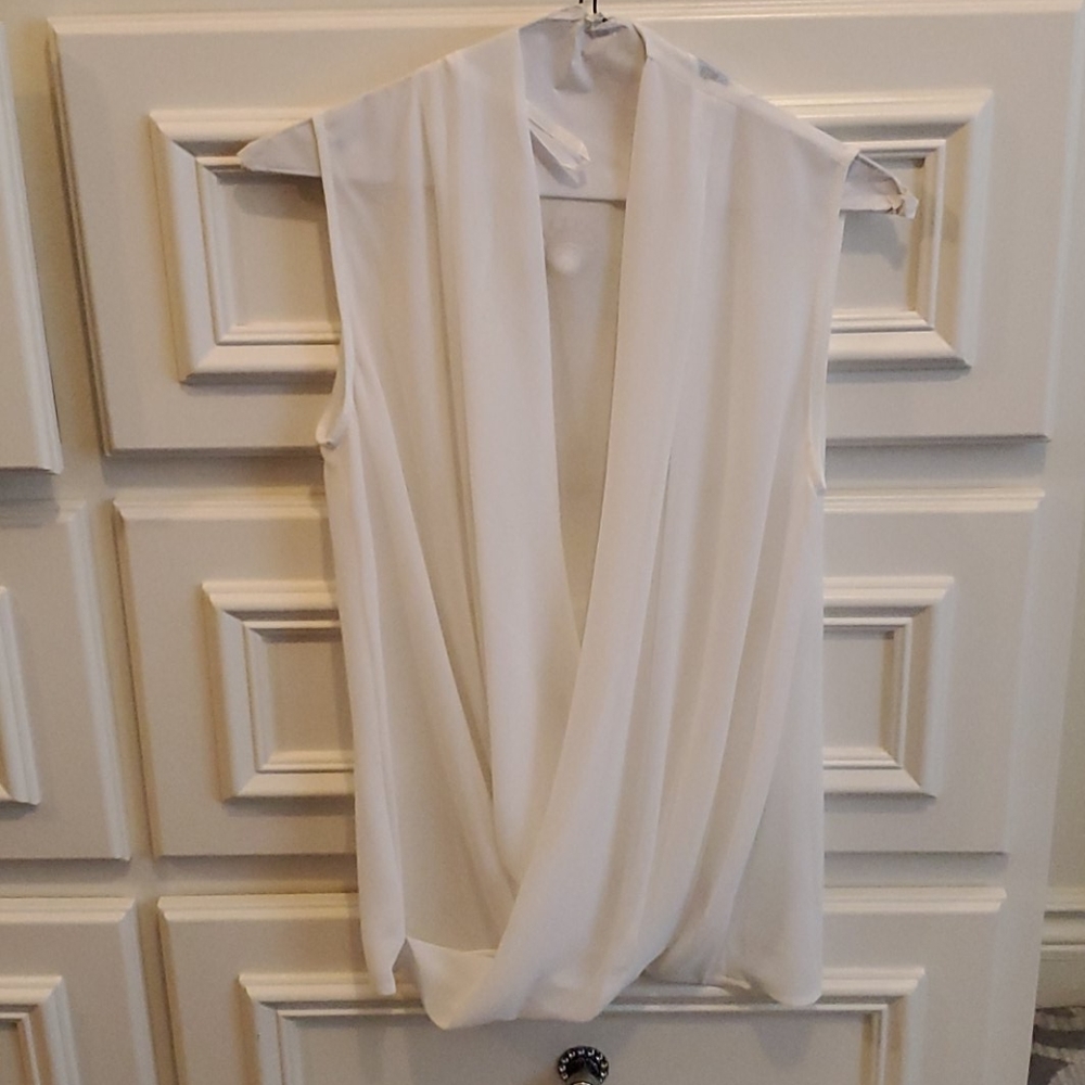Shear sleeveless top